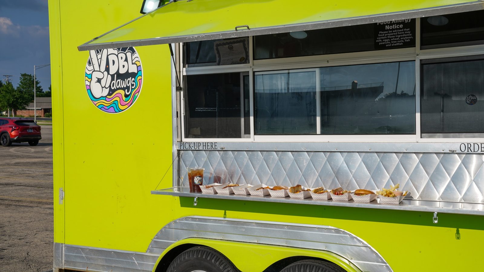 The bright green DBLdawgs food truck