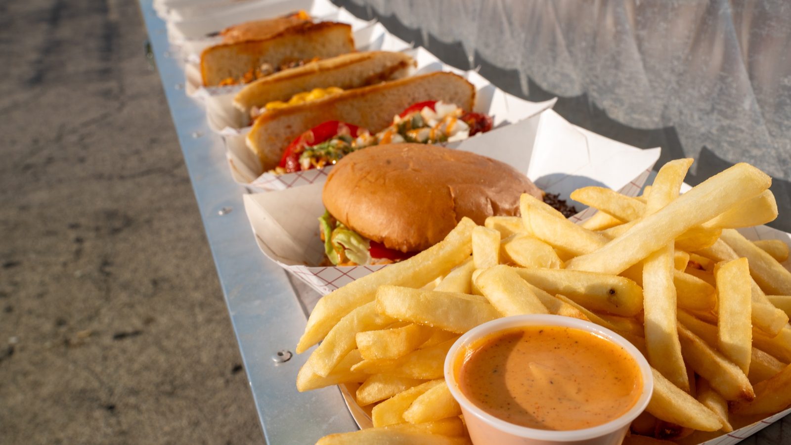 DBLdawgs burgers, dawgs, and beef tallow fries at the green truck